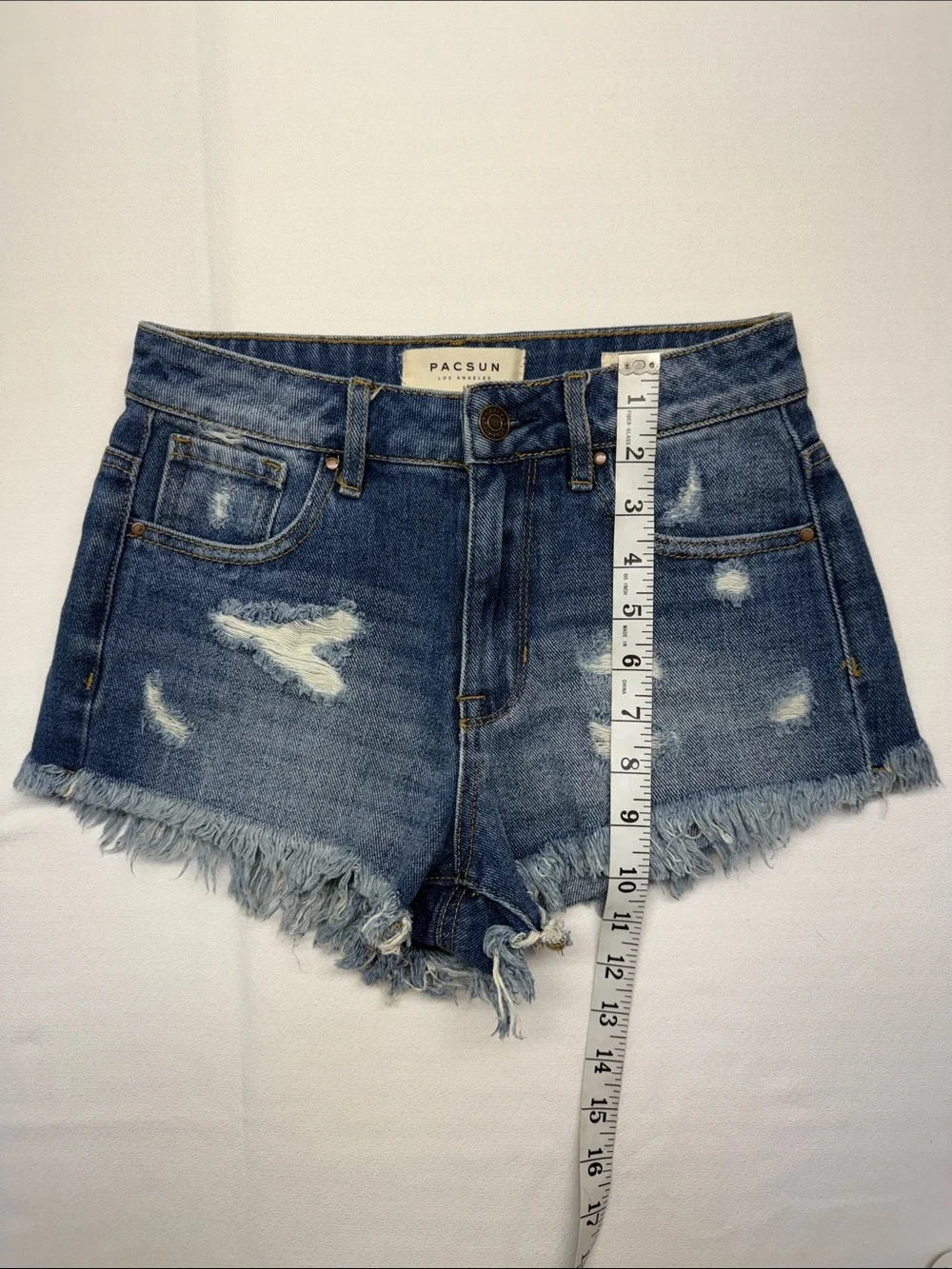 PacSun High Rise Festival Denim Shorts. Distressed Blue Denim Cutoff Shorts
